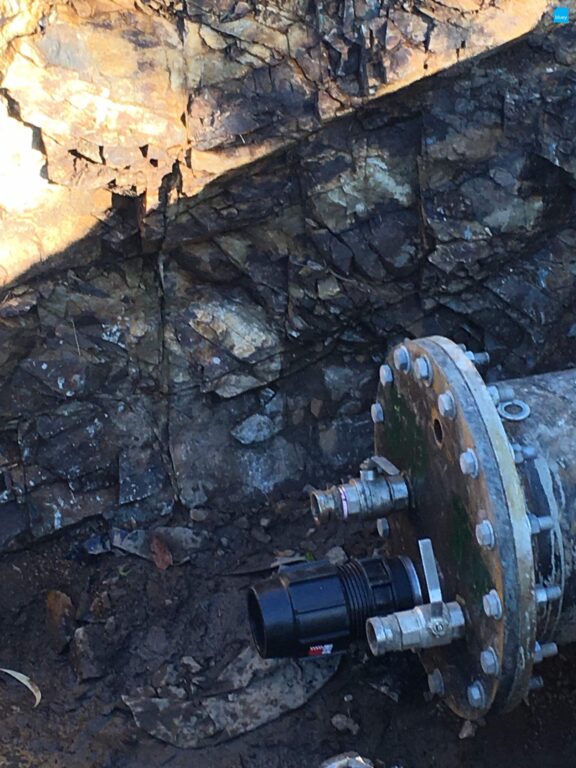 Filling a redundant pipe under Bootawa Dam.